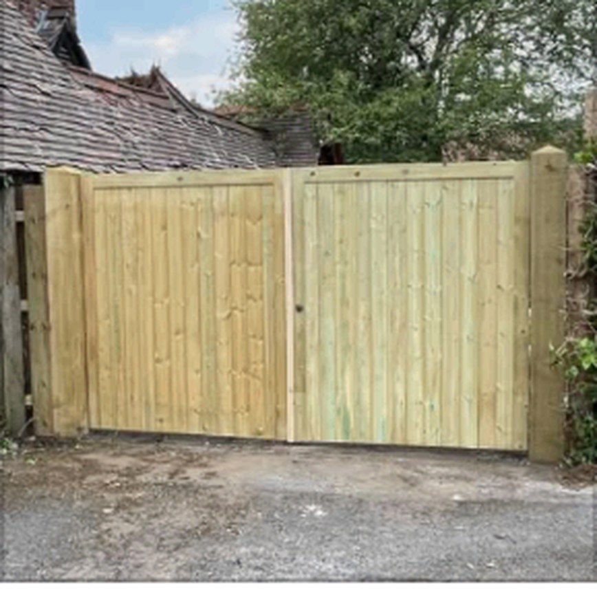 Pair of tall timber driveway gates
