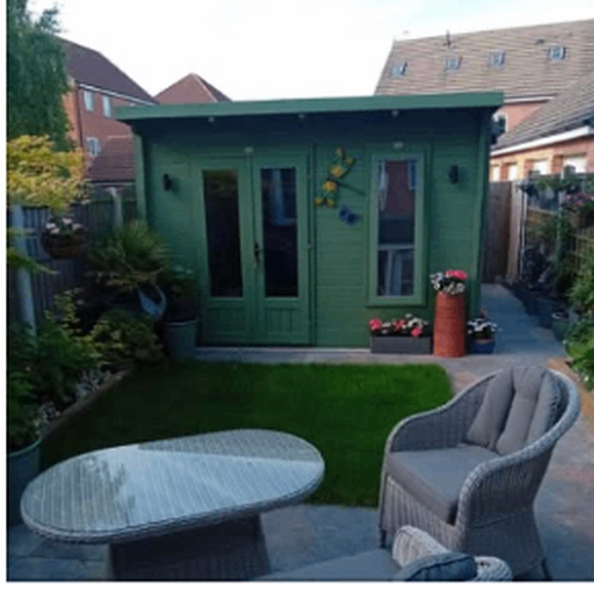 Timber garden room built at the end of a rear garden
